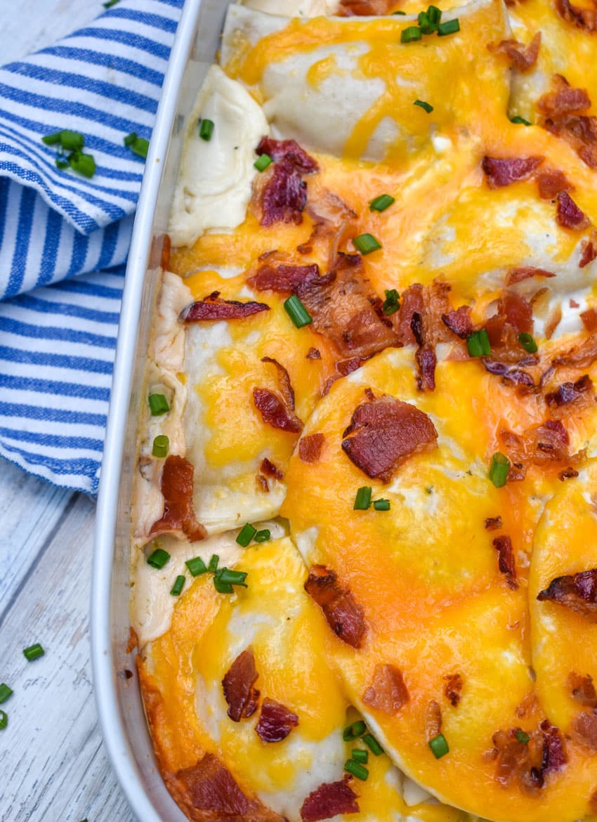 cheddar bacon ranch pierogi bake in a white casserole dish