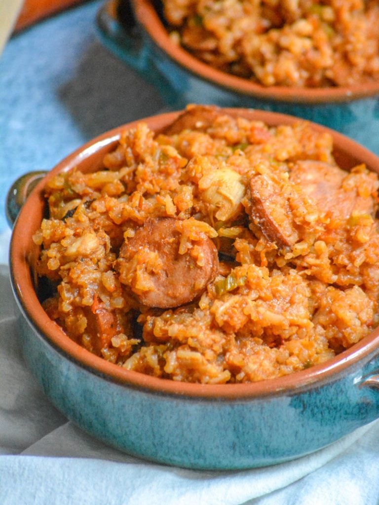 Dutch Oven Jambalaya served in blue glazed terra cotta bowls