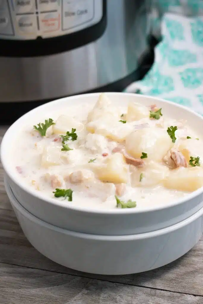 instant pot clam chowder in a white soup bowl