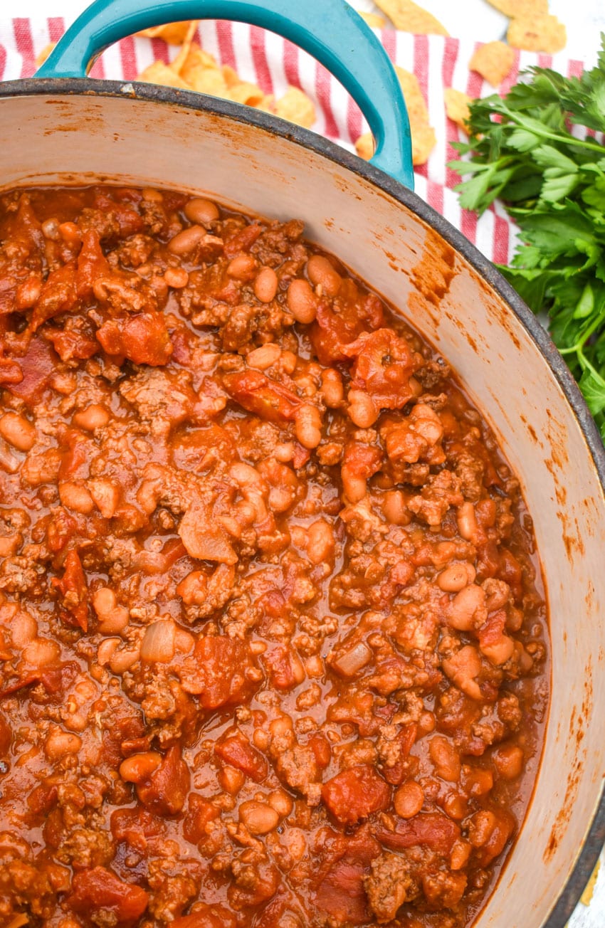 ground beef baked bean chili in a large dutch oven