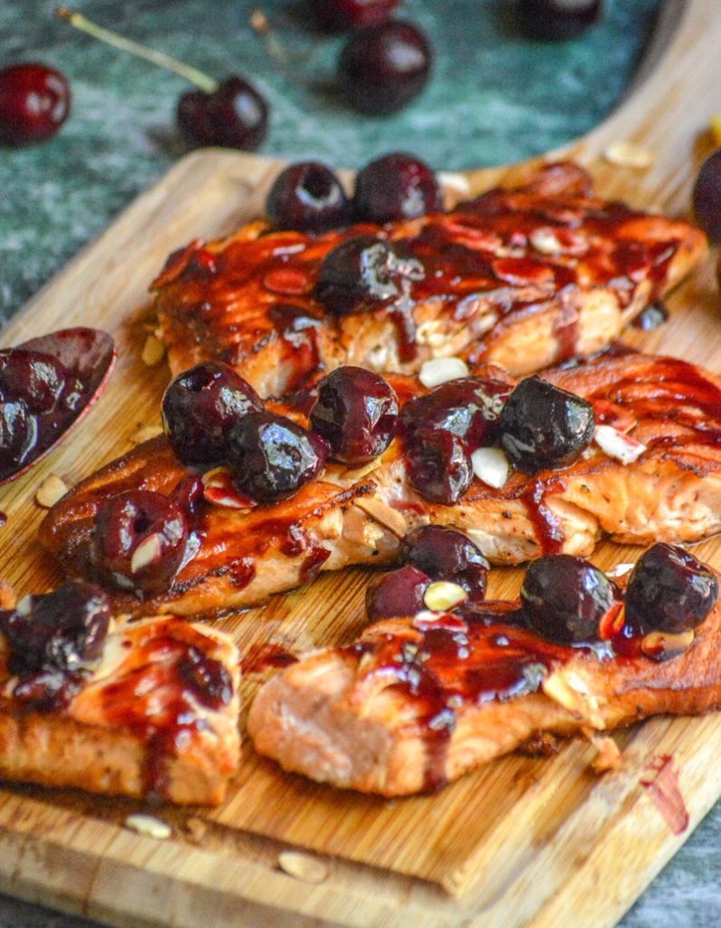 seasonal fresh salmon recipe using fresh cherries and a sweet almond glaze