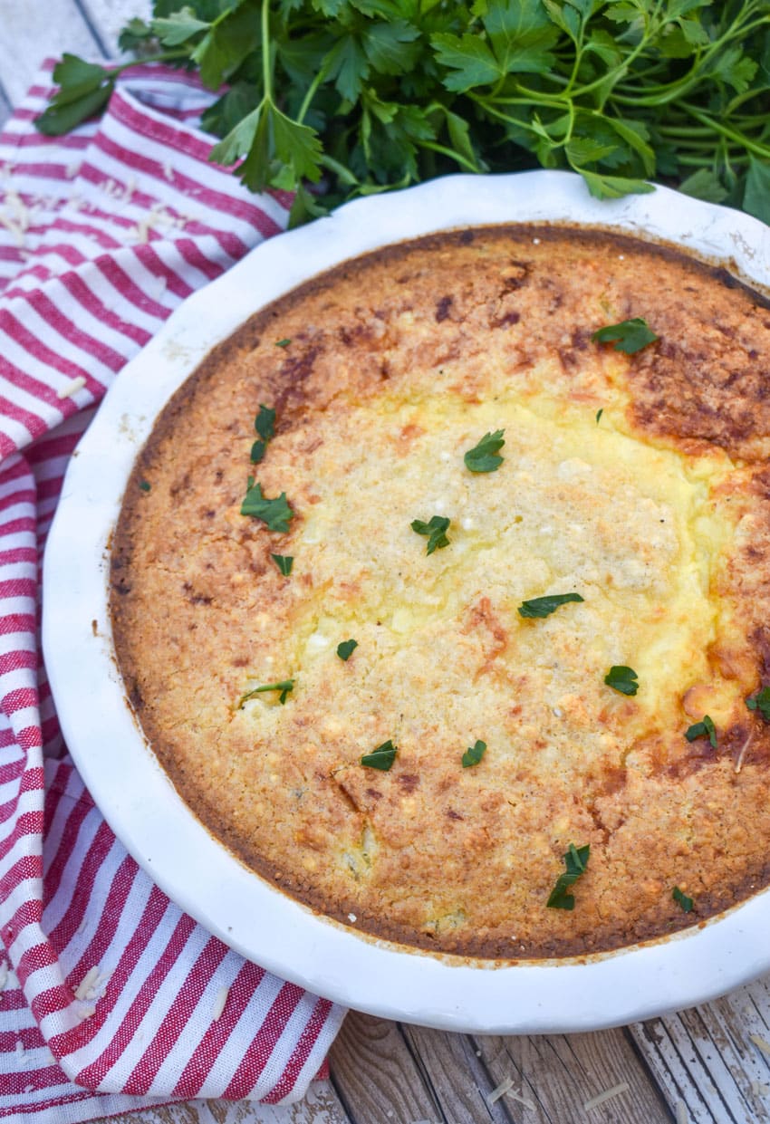 ham and swiss pie with bisquick in a white pie plate