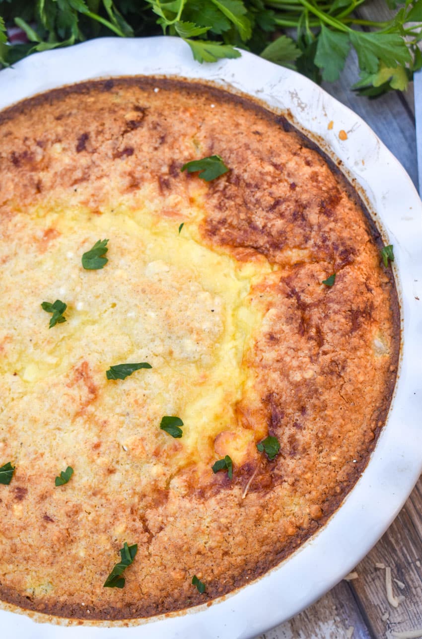 ham and swiss pie with bisquick in a white pie plate