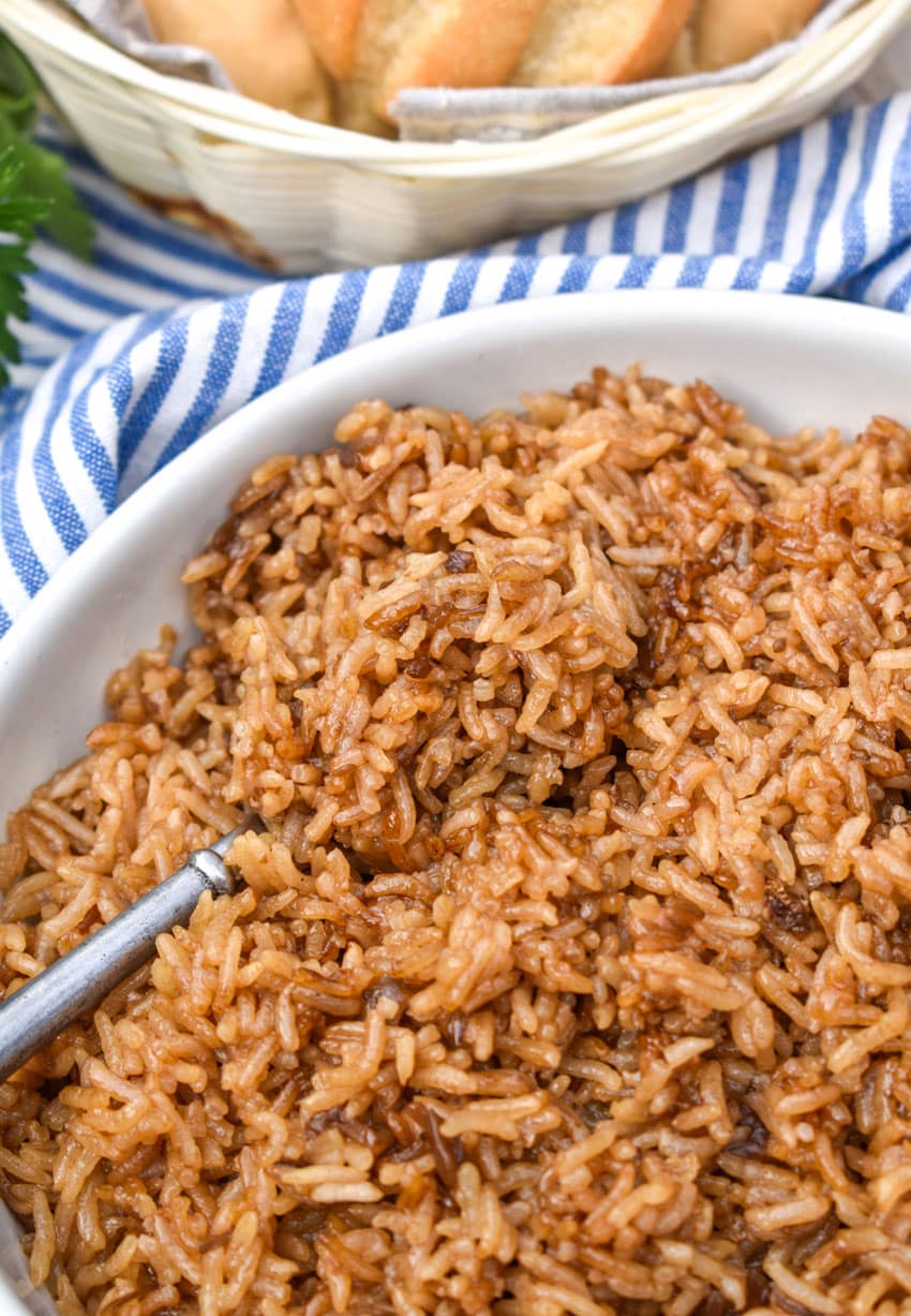 easy no peek rice in a white serving bowl