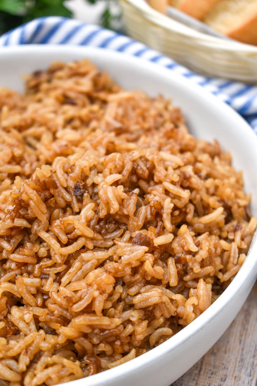 easy no peek rice in a white serving bowl