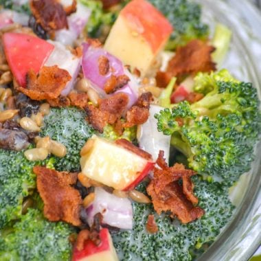 SWEET APPLE BROCCOLI AND BACON SALAD IN A GLASS BOWL