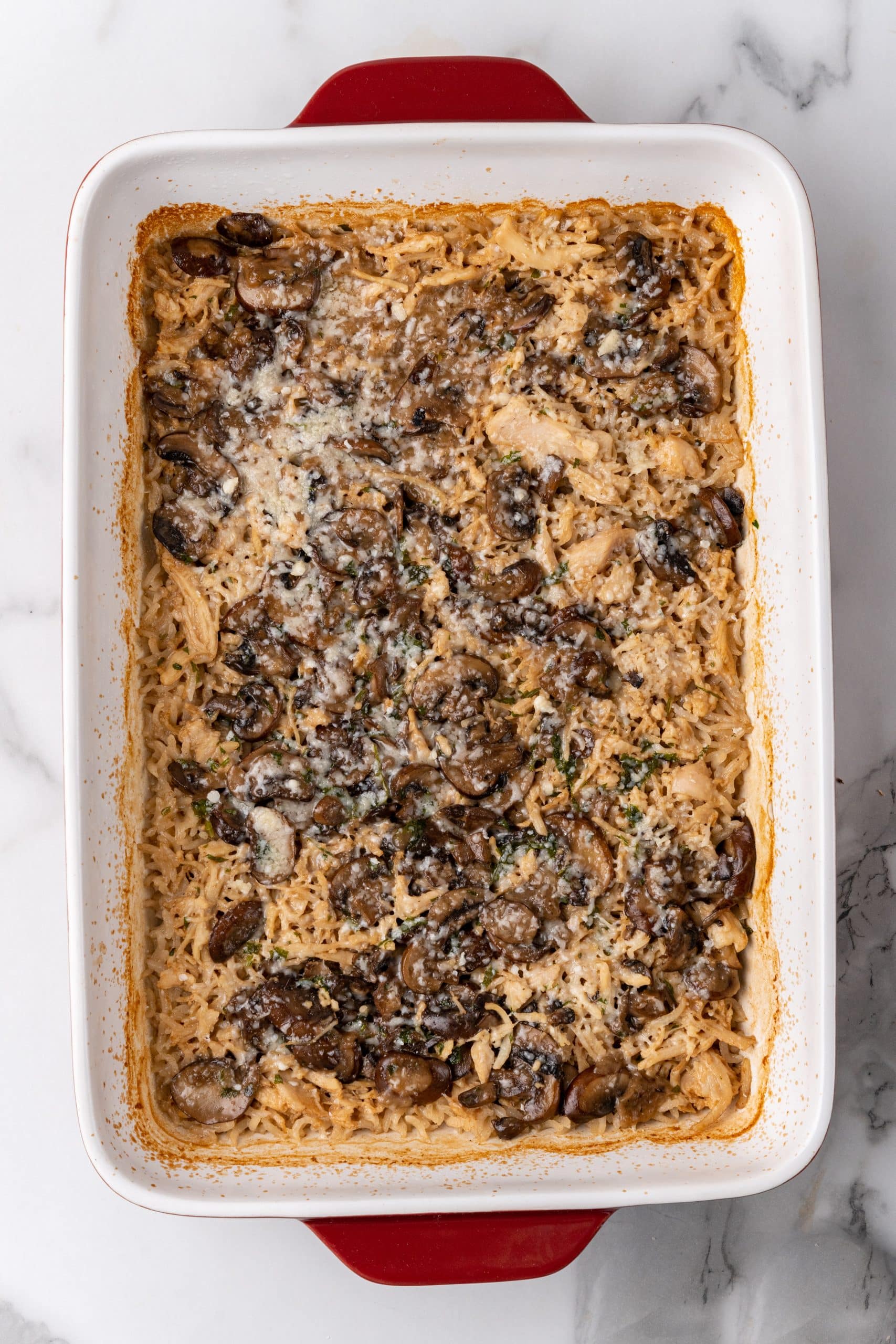 baked chicken marsala and rice casserole in a large casserole dish