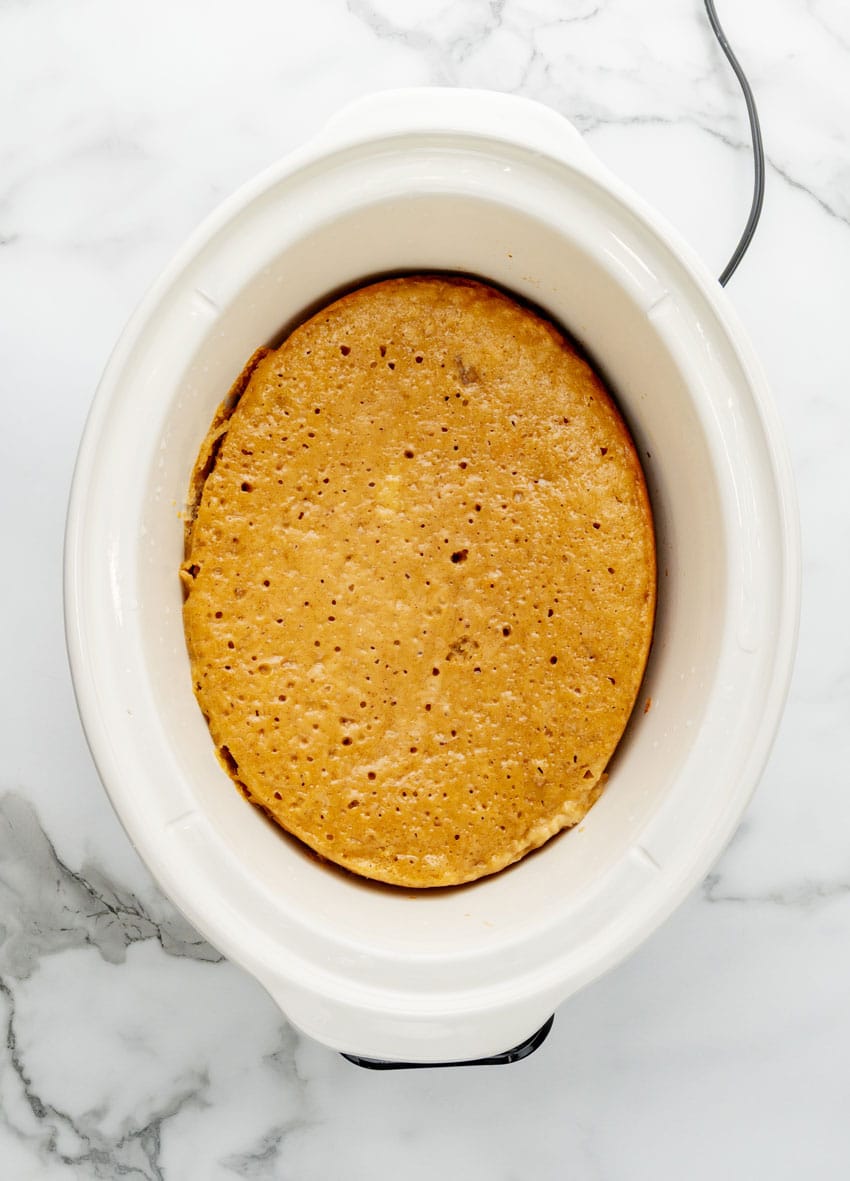 peanut butter banana cake in the bowl of a crockpot