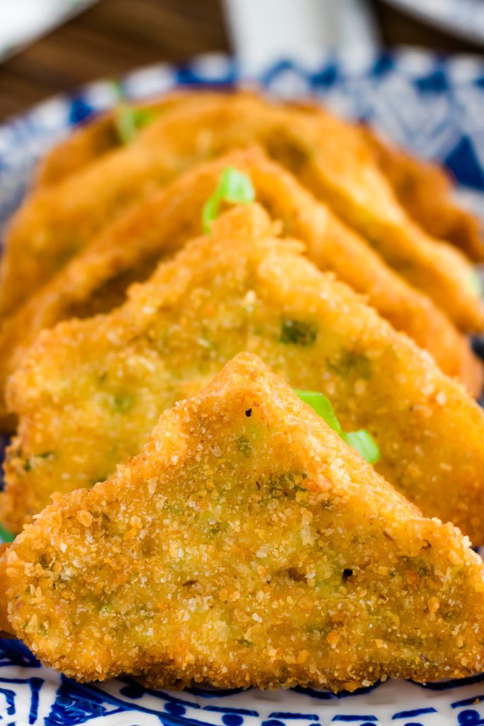 Shrimp Toast Recipe layered on a blue and white oriental style plate