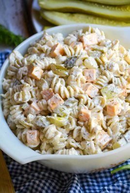 dill pickle pasta salad in a white pyrex bowl
