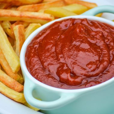 SMOKED KETCHUP RECIPE IN A SMALL GREEN BOWL