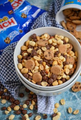 buncha crunch snack mix in a small white bowl
