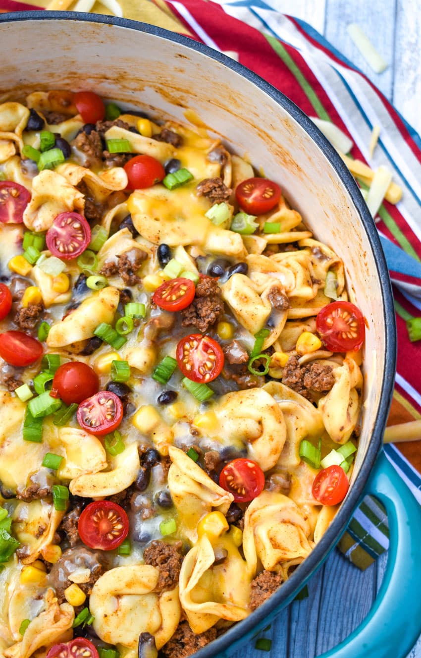 taco tortellini skillet in a large blue dutch oven
