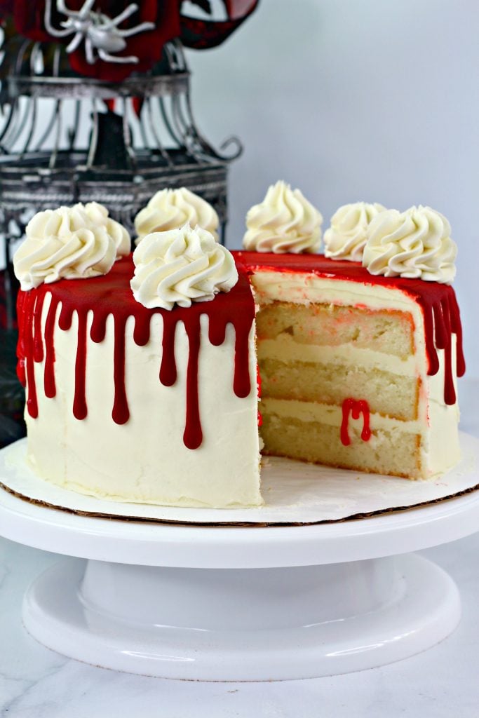 designer chef decorating white red bloody horror crime cake for halloween  party Stock Photo | Adobe Stock