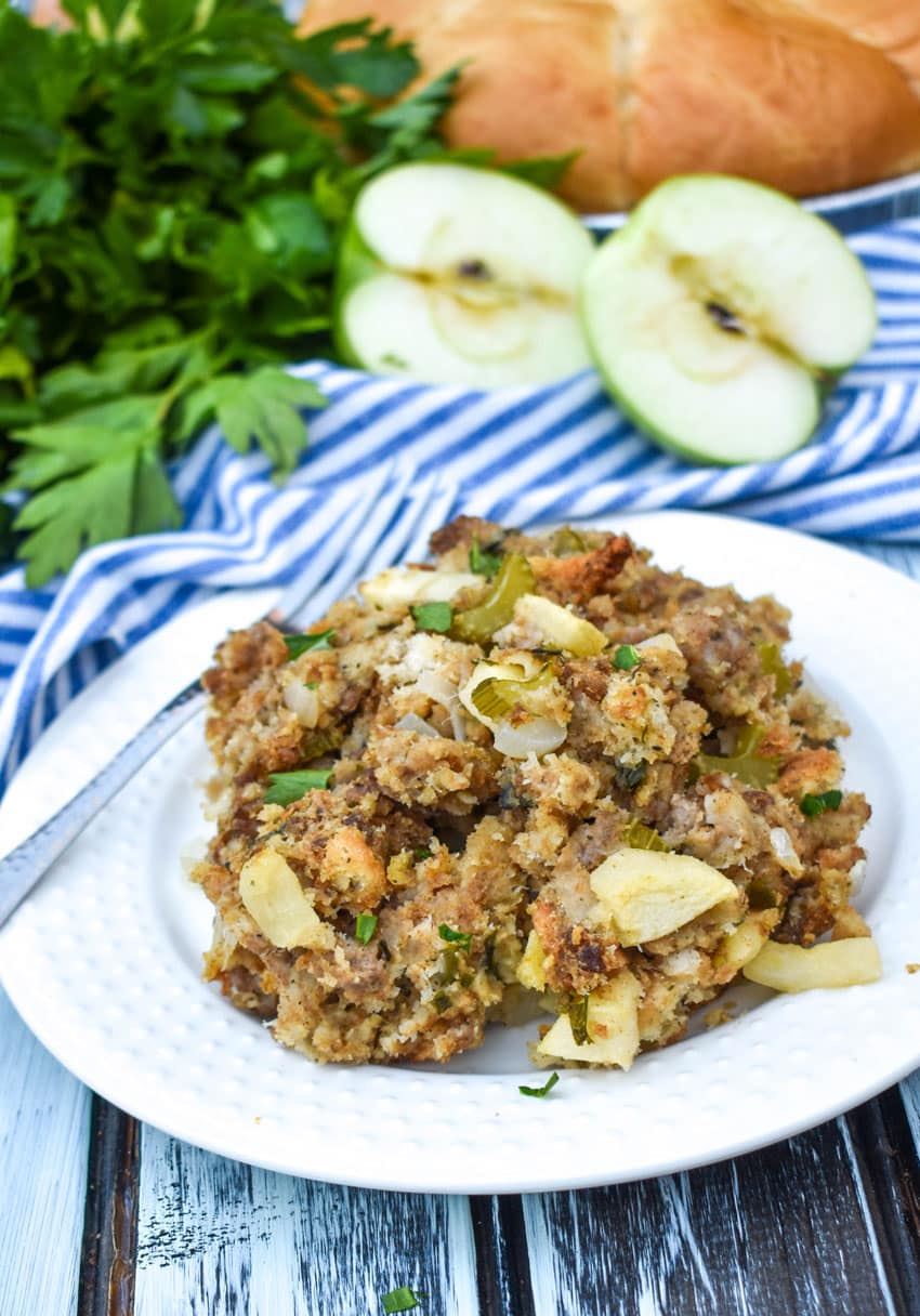 sausage, apple, and sage stuffing on a small white plate