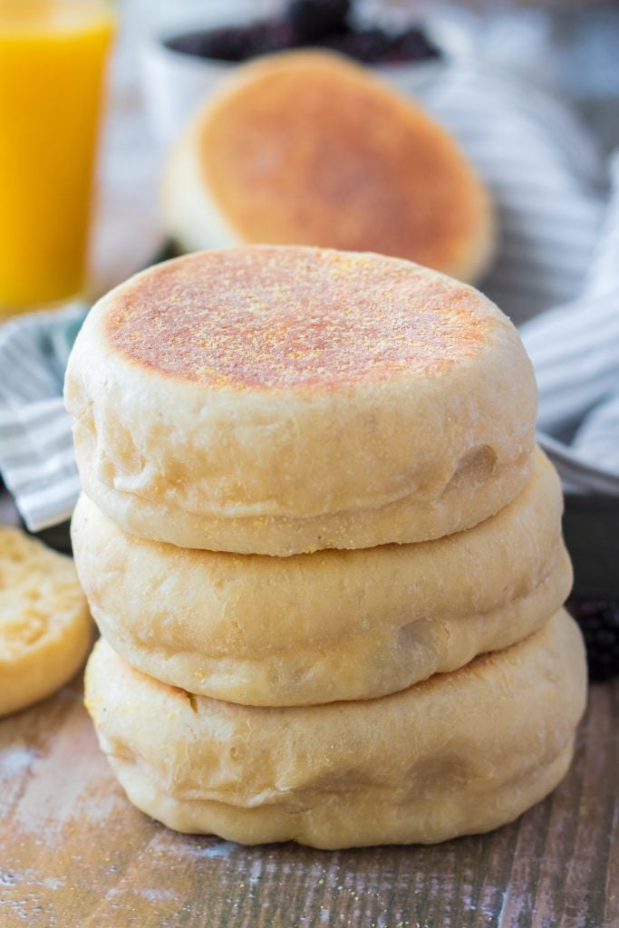 three homemade english muffins stacked on top of each other