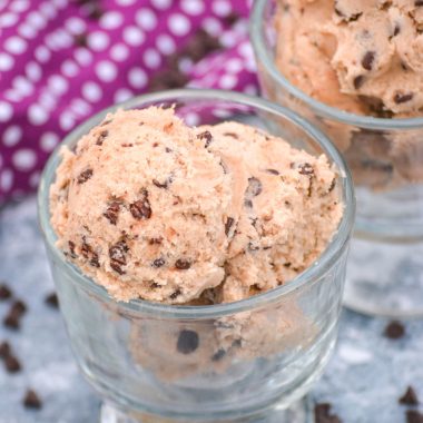 SCOOPS OF EDIBLE CHOCOLATE CHIP COOKIE DOUGH IN TWO SMALL GLASS BOWLS