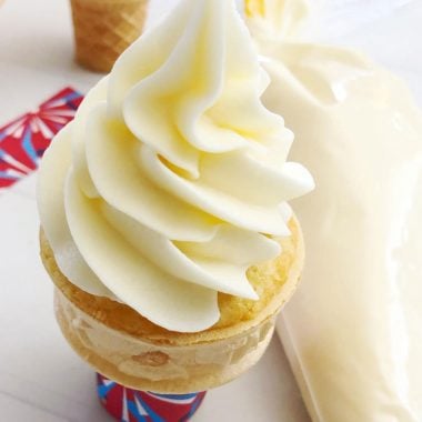 ice cream cone cupcakes are shown with white cake baked in flaky ice cream cone and topped with a tall swirl of white frosting