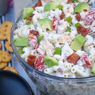 chicken club pasta salad in a large glass mixing bowl