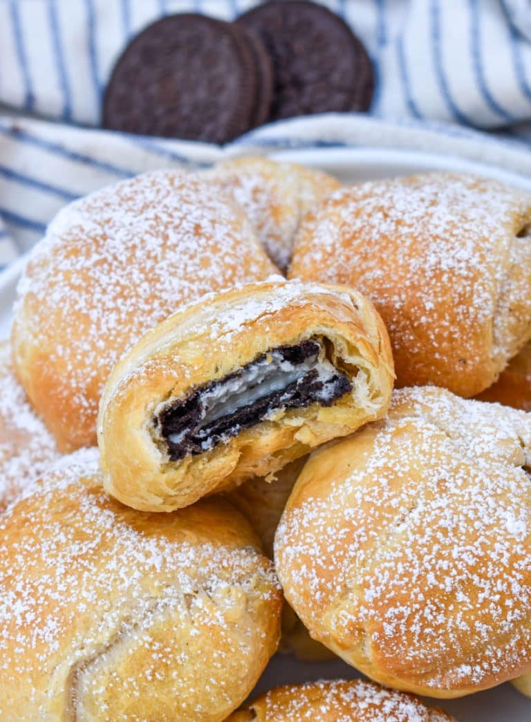 a pile of easy air fried oreos on a white serving plate