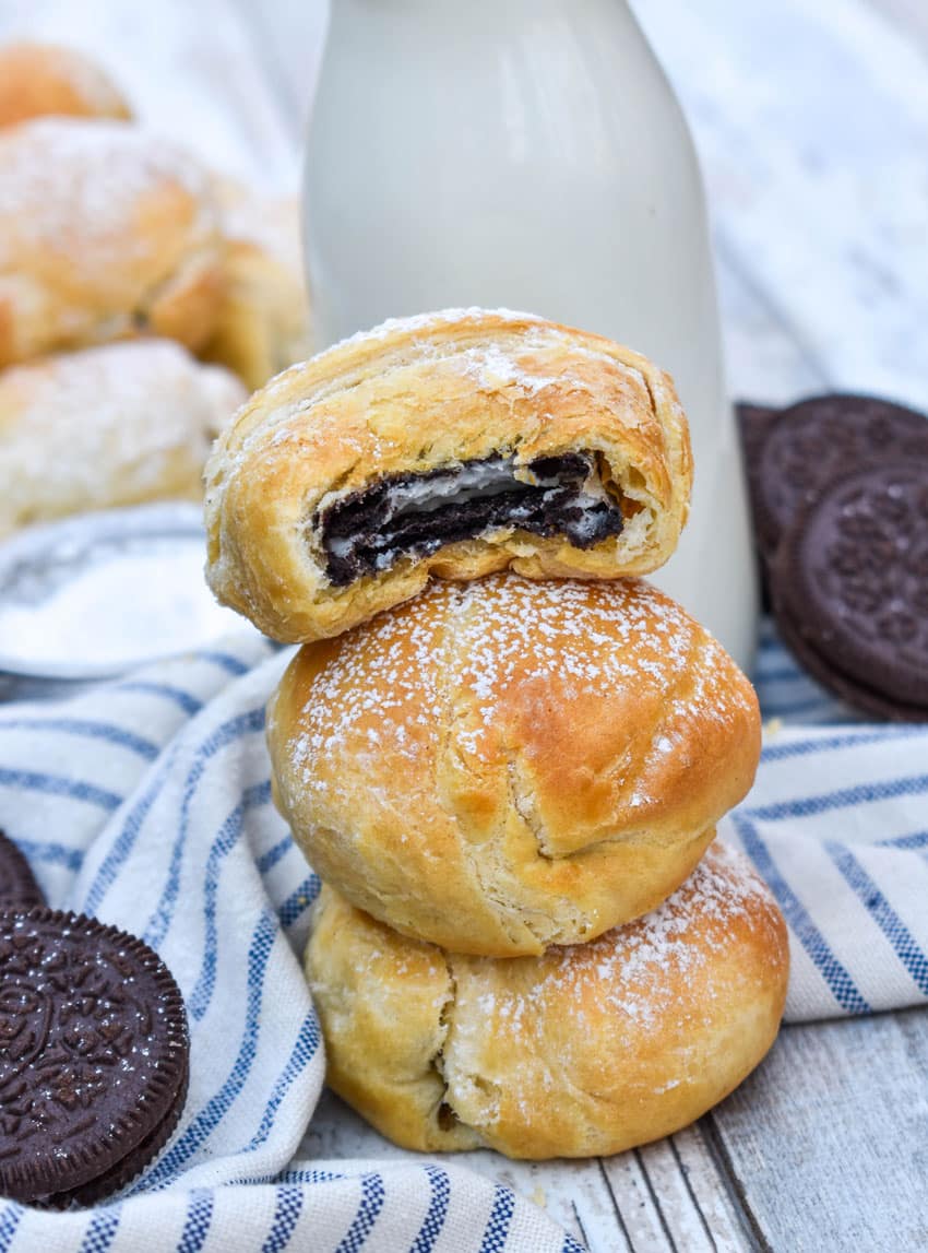 a stack of three easy air fried oreos on a wooden table