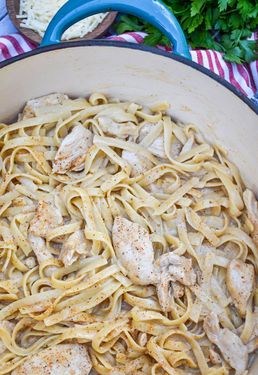 cajun chicken alfredo pasta in a large dutch oven