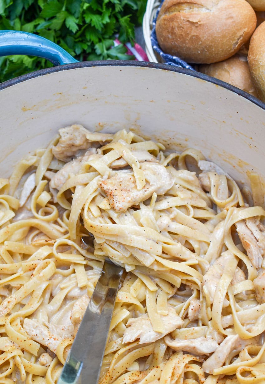 cajun chicken alfredo pasta in a large dutch oven
