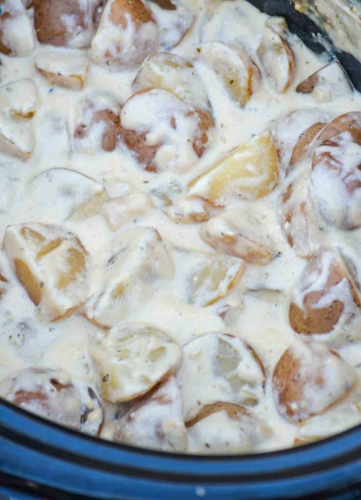 creamy ranch seasoned potatoes in the bowl of a crockpot
