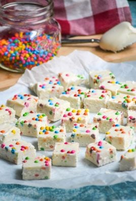 rainbow chip fudge made from frosting shown on parchment paper