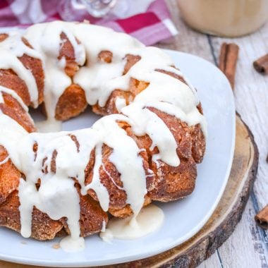 eggnog monkey bread shown served on a large white plate