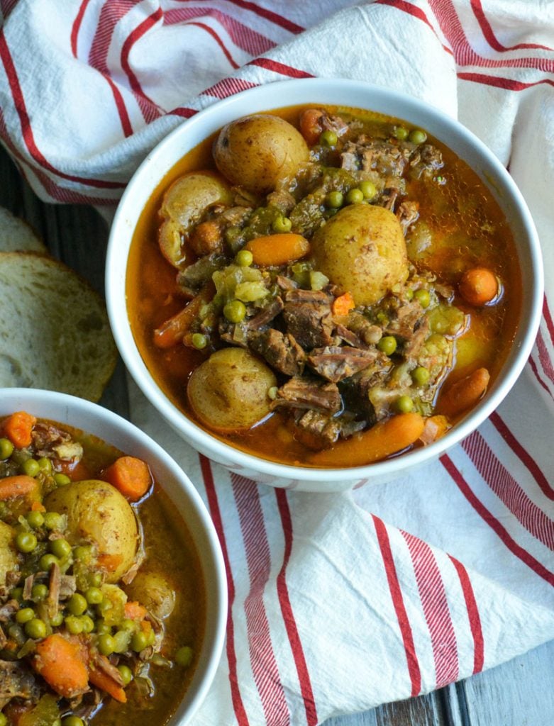 savory instant pot beef stew served in a white bowl