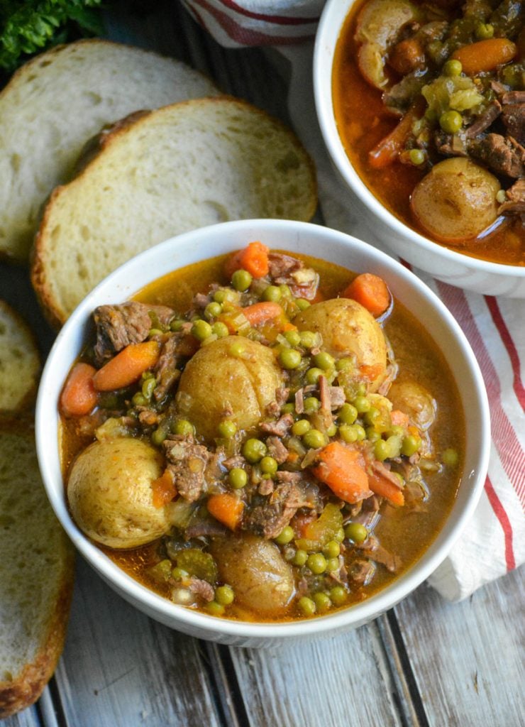 savory instant pot beef stew served in a white bowl