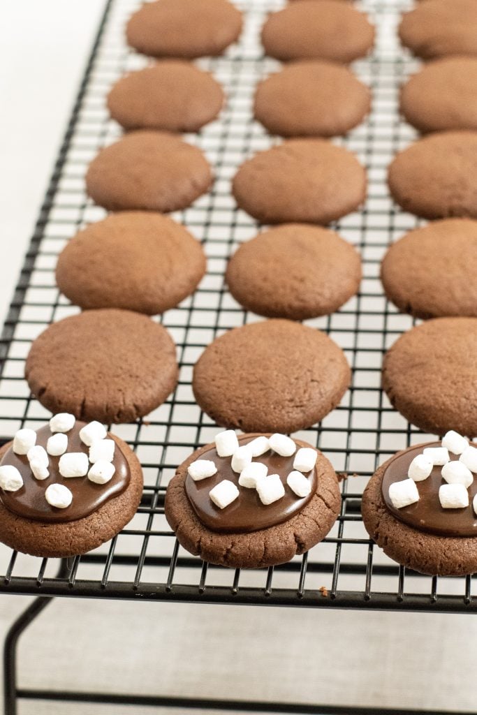 hot chocolate cookies shown on a metal wire cooling rack
