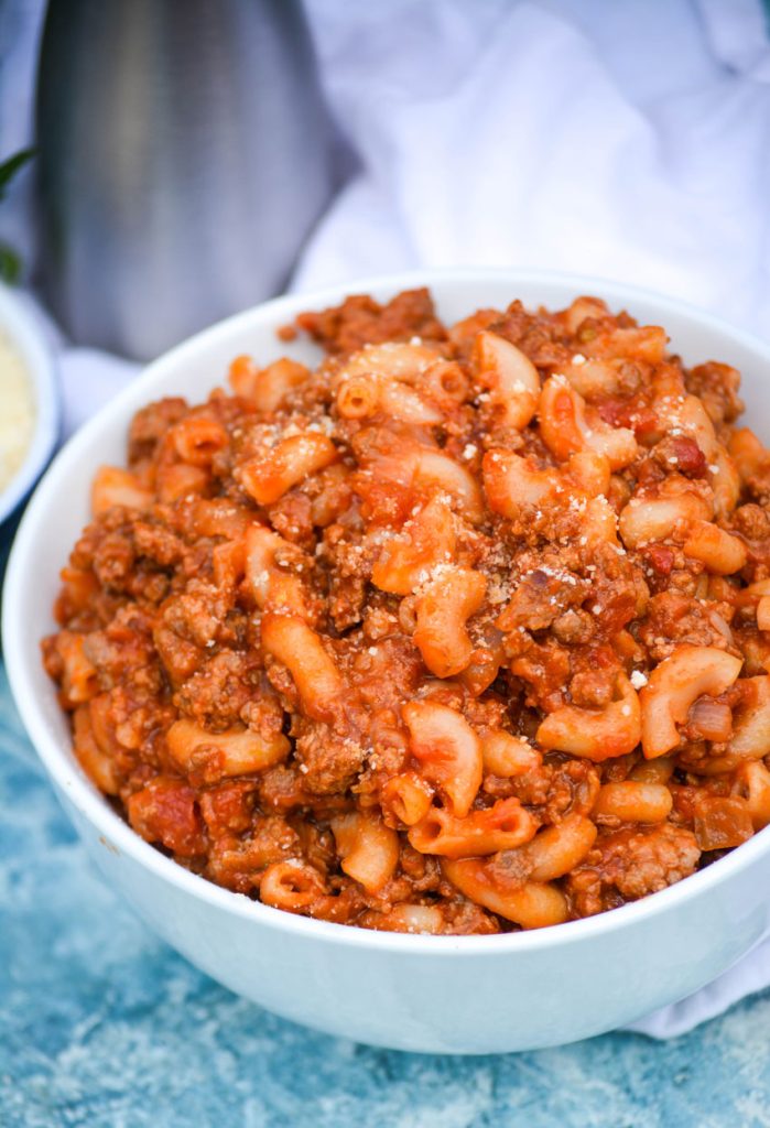 a white bowl filled with homemade beefaroni