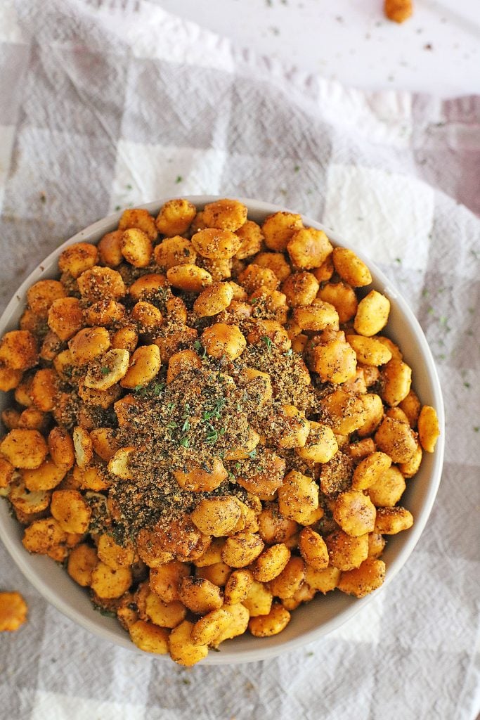 a white bowl filled with taco seasoned oyster crackers