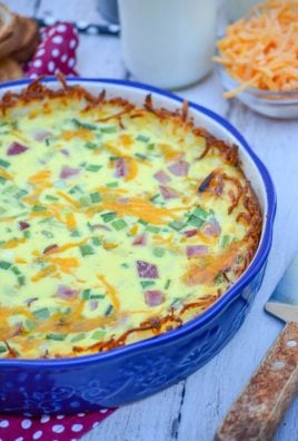 hash brown crusted quiche in a blue pie dish