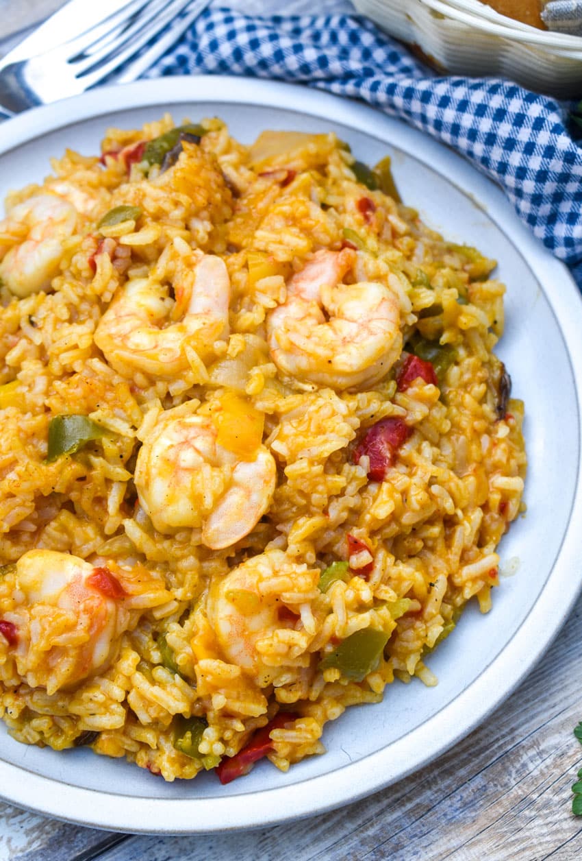 shrimp and rice casserole served on a white dinner plate