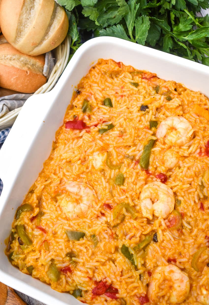shrimp and rice casserole in a white square baking dish