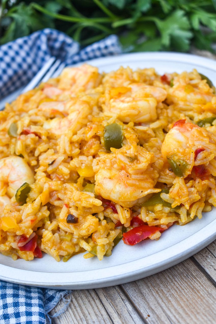 shrimp and rice casserole served on a white dinner plate