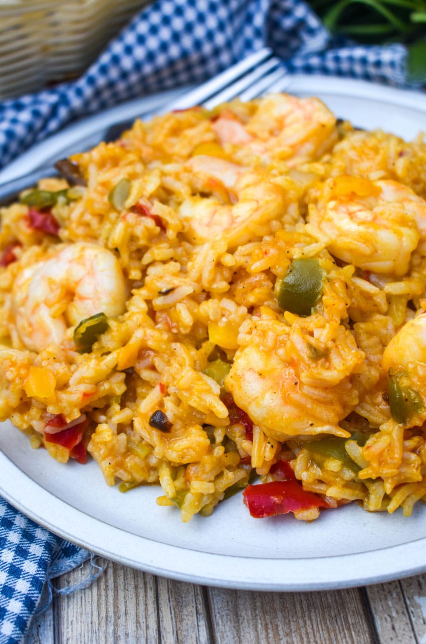 shrimp and rice casserole served on a white dinner plate