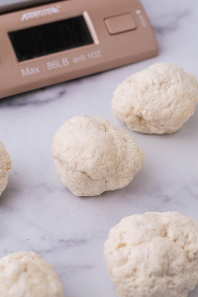 balls of 2 ingredient dough shown measured out for air fryer hot pockets