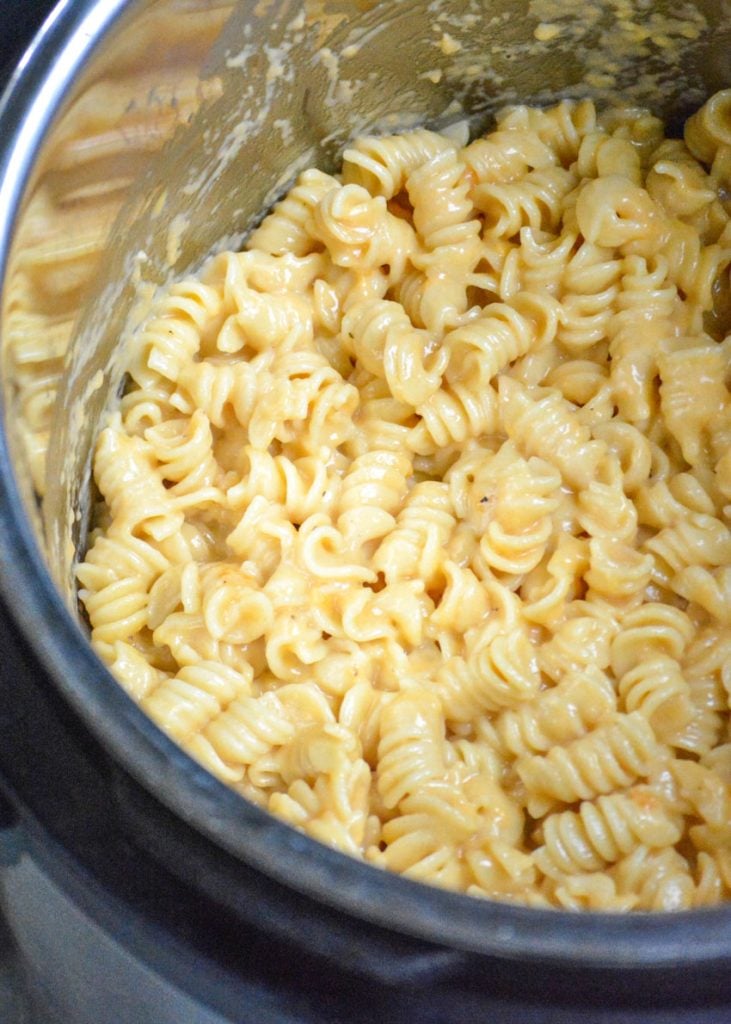 creamy mac and cheese shown in the stainless steel insert of an Instant Pot