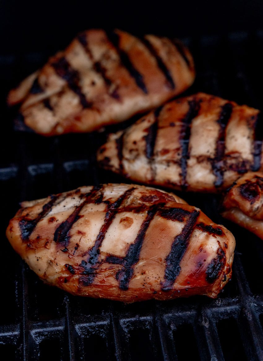 marinated teriyaki chicken breasts on a grill