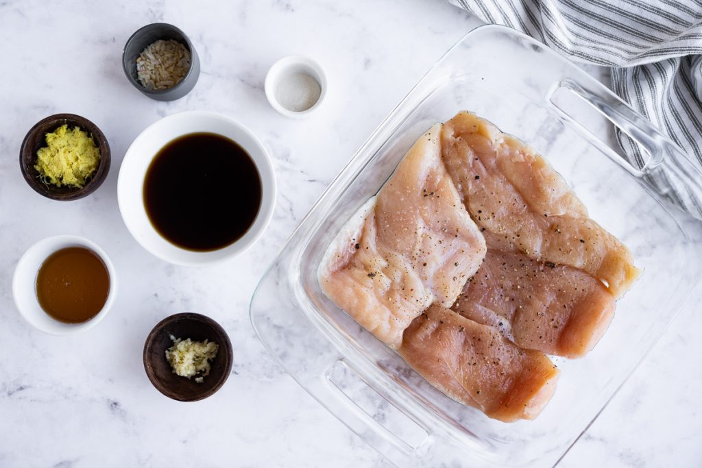 an overhead shot showing all of the ingredients needed to make grilled teriyaki chicken