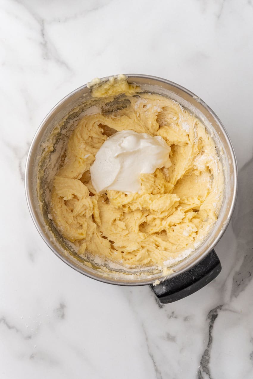 lemon yogurt cake batter in a large metal bowl