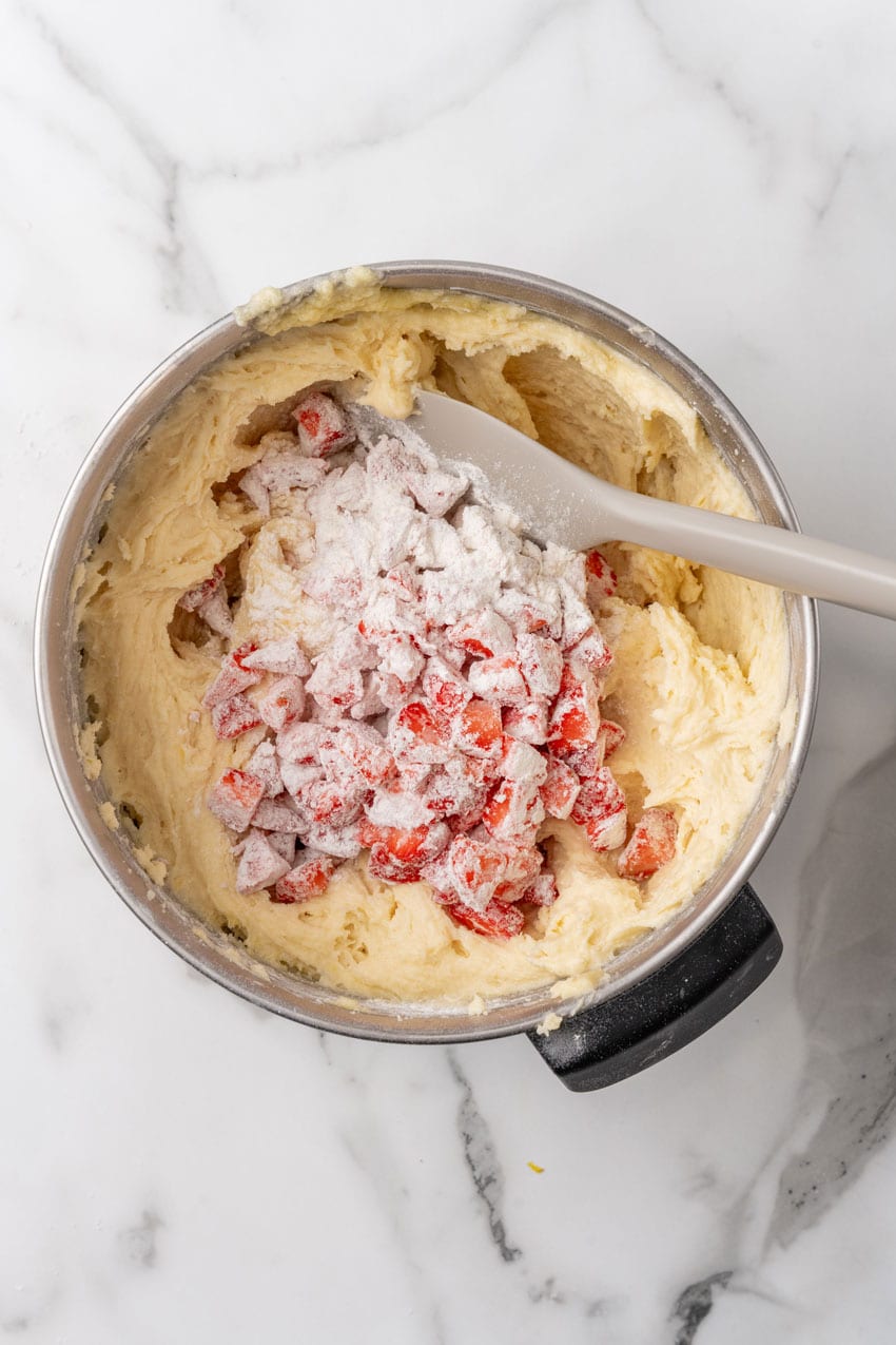 strawberry lemon yogurt cake batter in a large metal bowl
