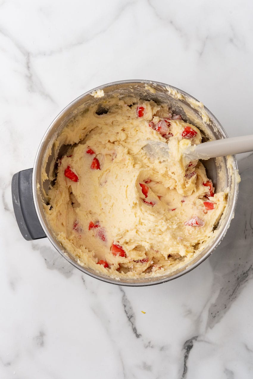 strawberry lemon yogurt cake batter in a large metal bowl