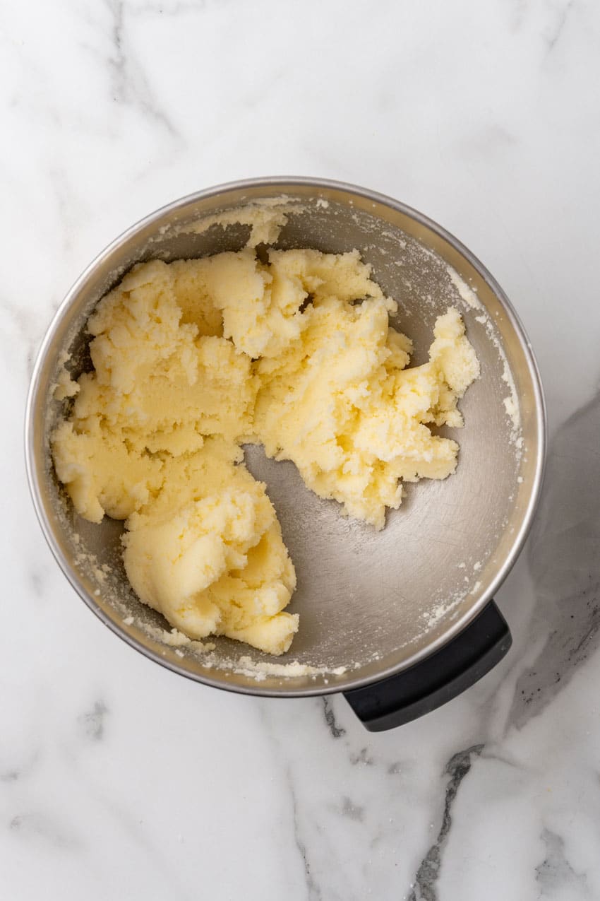 creamed butter and sugar in a large metal bowl