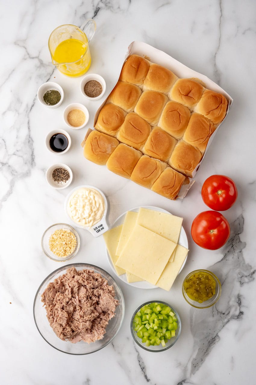 an overhead image showing the measured ingredients needed to make a batch of tuna melt sliders