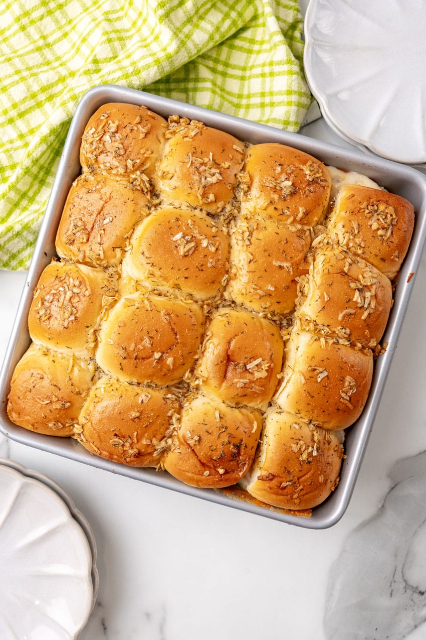baked tuna melt sliders in a square metal baking dish